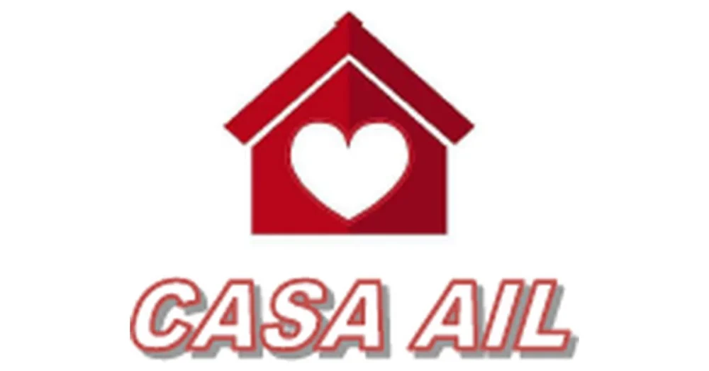 Logo del progetto Casa AIL di AIL Cagliari: casetta rossa con un cuore bianco al centro